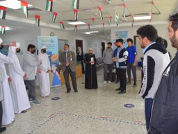GR-12-Boys giving donation at Sharjah City for HumanitarianServices